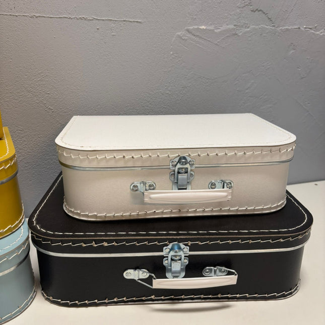 Pakket koffertjes die bij ons uit gaan